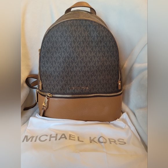 Michael Kors Handbags - Michael Kors Acorn Brown backpack